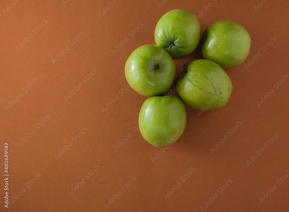 green Kul fruit or indian jujube or chinese date used for offering in bengali indian hindu festival saraswati puja and vasant panchami. green Kul fruit or indian jujube or chinese date used for offering in bengali indian hindu festival saraswati puja and vasant panchami.