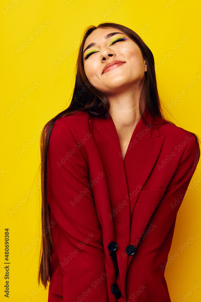 young woman in a red jacket cosmetics smile Lifestyle unaltered young woman in a red jacket cosmetics smile Lifestyle unaltered