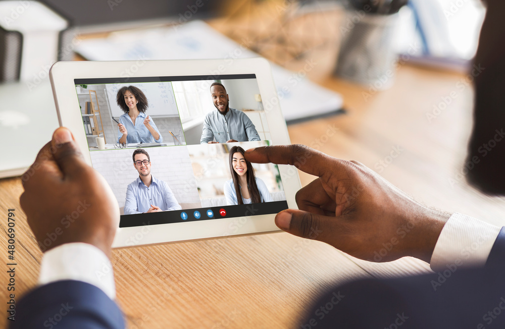 Remote Meeting. Black Businessman Using Digital Tablet For Online Conference  With Colleagues Stock-Foto | Adobe Stock