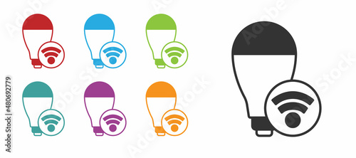 Black Smart light bulb system icon isolated on white background. Energy and idea symbol. Internet of things concept with wireless connection. Set icons colorful. Vector