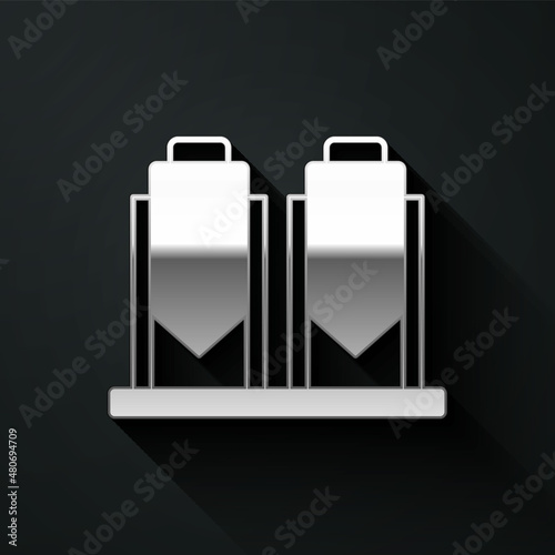 Silver Traditional brewing vessels in brewery icon isolated on black background. Beer brewing process. Distillery plant, brewery. Long shadow style. Vector