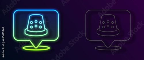 Glowing neon line Thimble for sewing icon isolated on black background. Vector