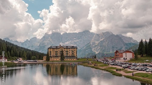 Establishing aerial view of Lago di Misurina, lake Misurina and Opera Diocesana  Dolomites Alps Mountains, National Park Tre Cime di Lavaredo, Dolomiti Alps, South Tyrol, Italy photo