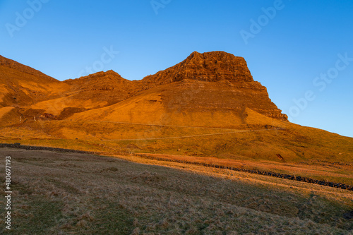 Sunset over a volcanic archipelago  Faroe Islands.