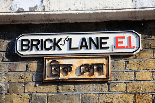 Brick Lane road sign in Whitechapel Tower Hamlets London England UK which is commonly known as Banglatown and is popular for its street market traders, stock photo image photo