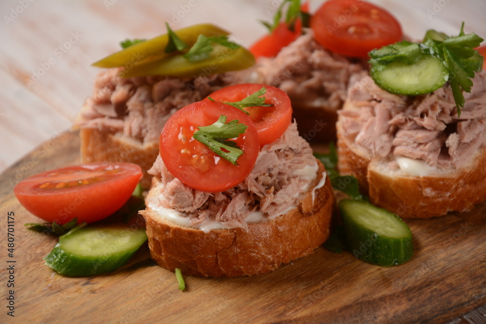 Open sandwich with canned tuna, cucumber, tomatoes, pickled cucumber Open sandwich with canned tuna, cucumber, tomatoes, pickled cucumber