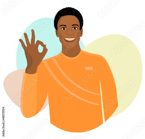 An African American man smiling. An avatar of a happy black man in a sweater. A portrait of a human face. 