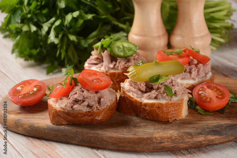 Open sandwich with canned tuna, cucumber, tomatoes, pickled cucumber Open sandwich with canned tuna, cucumber, tomatoes, pickled cucumber