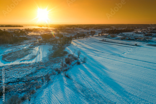 Winter evening in the countryside. Aerial view © vvvita
