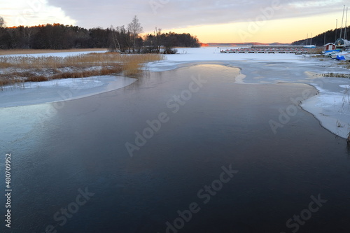 Beautiful winter photo. Swedish frozen lake called Mälaren or Malar. Stockholm, Sweden, Europe. © Martin of Sweden
