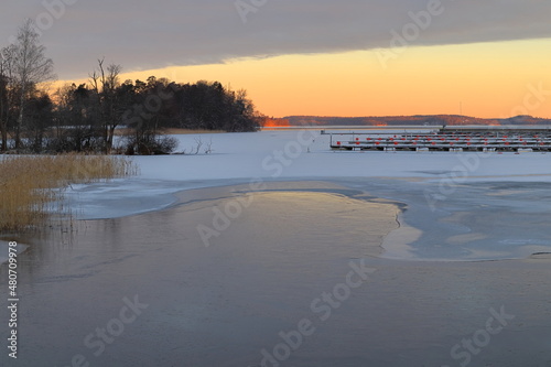 Beautiful winter photo. Swedish frozen lake called Mälaren or Malar. Stockholm, Sweden, Europe.