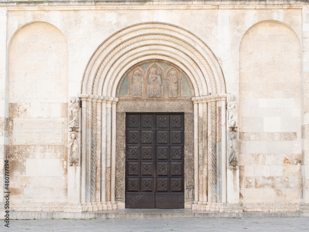 Richly decorated main portal of the cathedral of St Anastasia, Roman Catholic cathedral of Zadar, Croatia, in Romanesque style