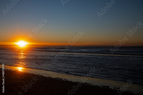 Sunset over the ocean at the beach