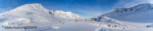 panorama of the Tatra Mountains, winter mountain landscape in the Tatras, mountain view covered with snow in frosty sunny weather © Tania
