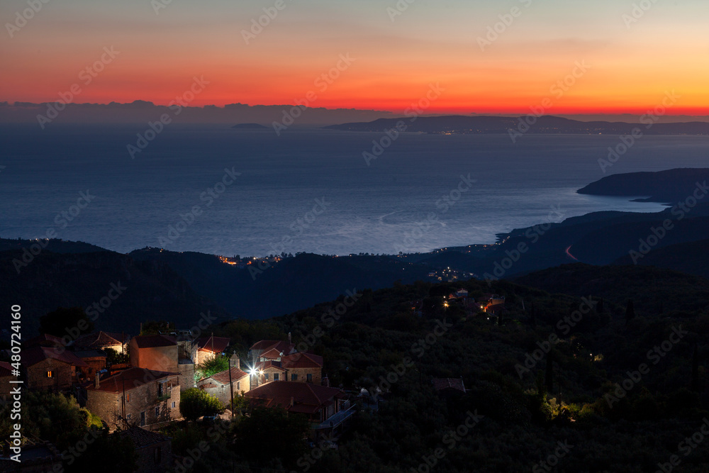 Fototapeta premium Beautiful sunset view of Messinia gulf from the mountainous village of Tseria, in the famous Mani region, in Peloponnese, Greece, Europe.