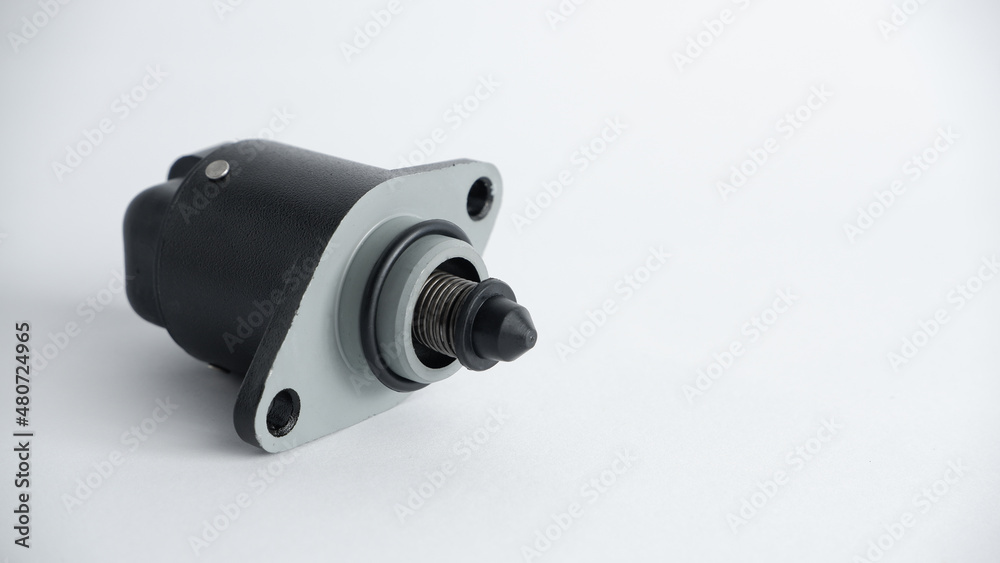 Auto parts . Car injector engine idler . close up on white background. idle air control valve Auto parts . Car injector engine idler . close up on white background. idle air control valve