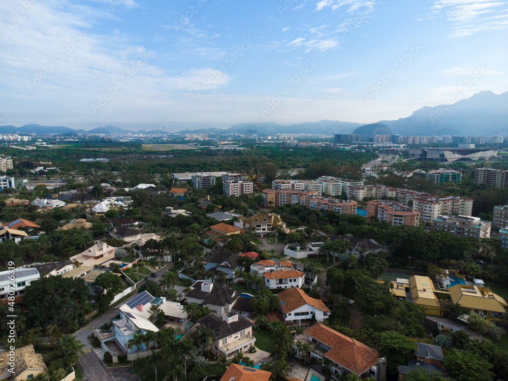 Aerial view of Barra da Tijuca. In the background hill of Rio de Janeiro, Brazil. Dawn. Sunny day with some clouds. Drone photo