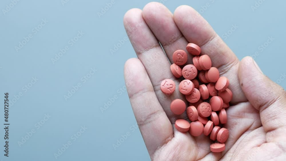 fever or pain relief medical pill on hand fever or pain relief medical pill on hand