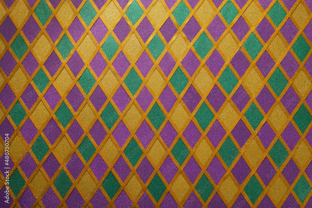Shiny green, purple and golden glittering paillettes diamonds fabric. Mardi Gras holiday background. - obrazy, fototapety, plakaty 