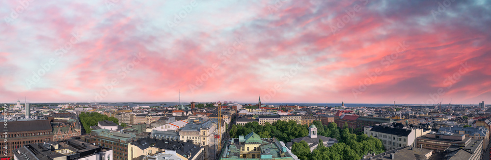 Panoramic aerial view of Helsinki at sunset from city tower, Finland.
