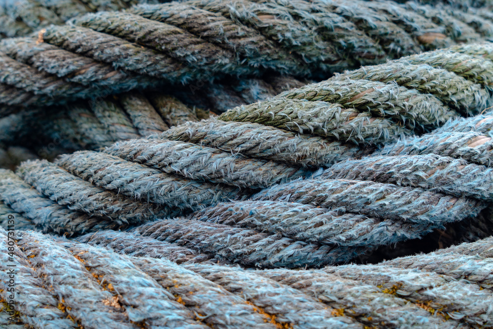 Rope texture of old blue mooring.