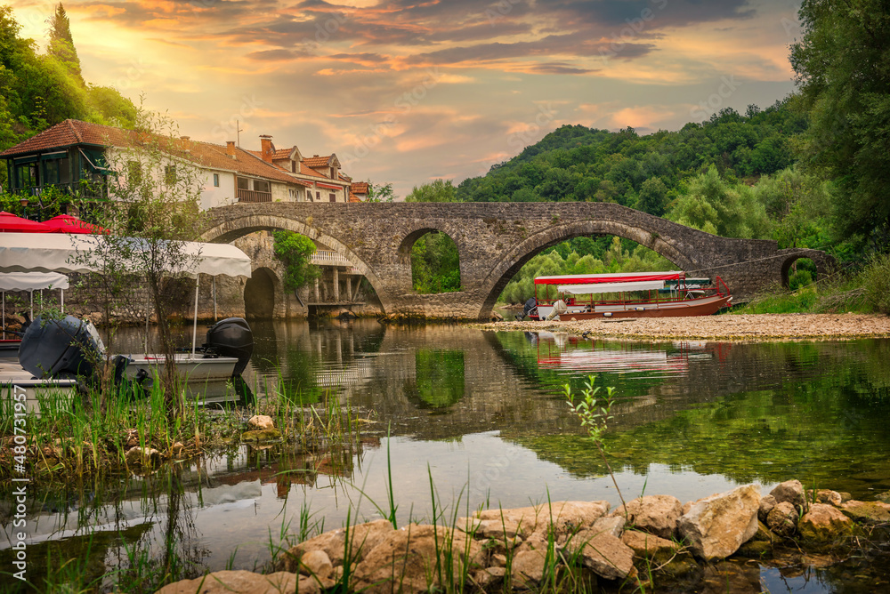 Arched bridge at sunset