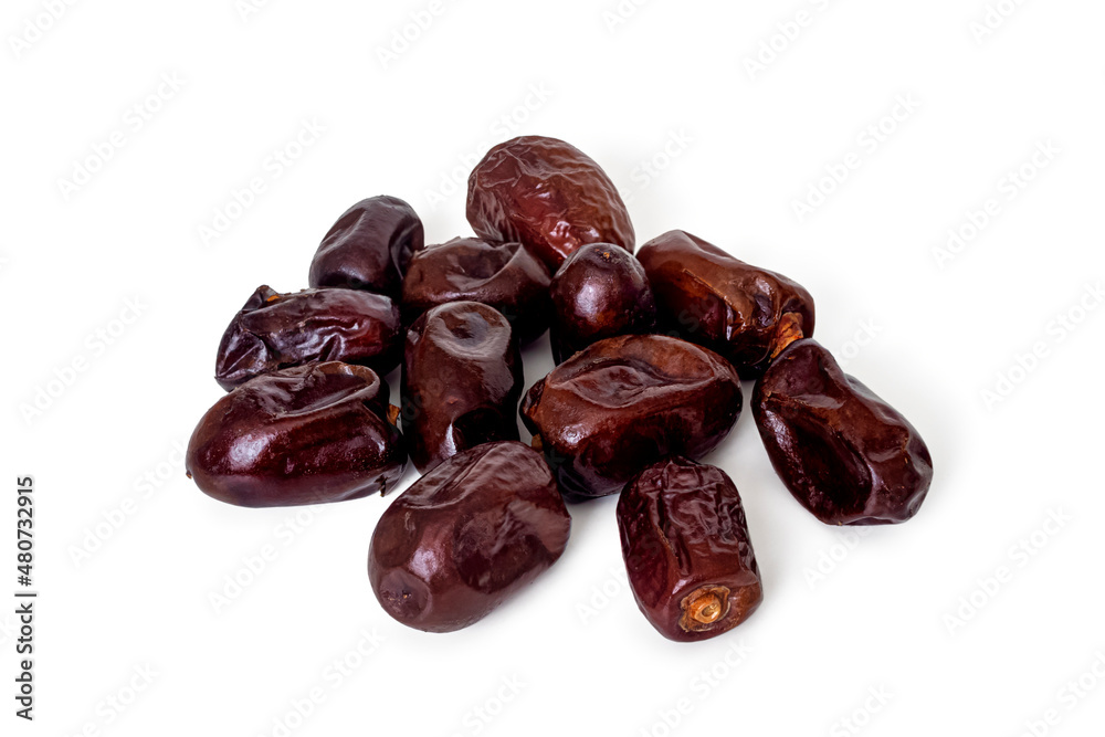 Dried dates - edible fruits of the date palm Dried dates - edible fruits of the date palm