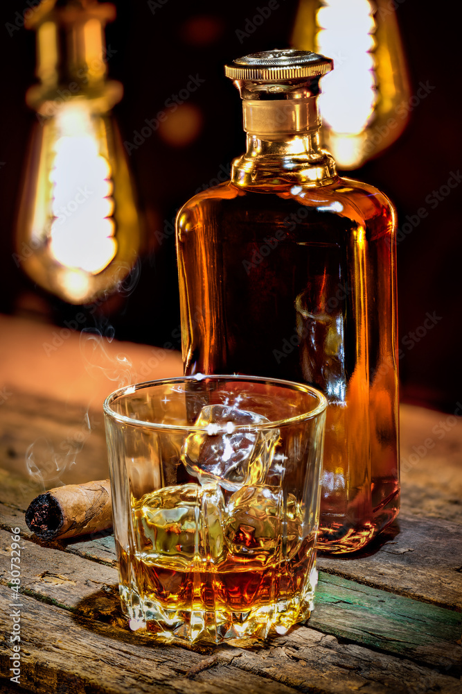 Glass of whiskey and cigar Glass of whiskey and cigar