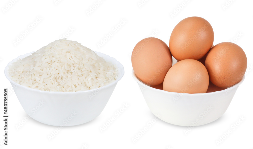 Rice and chicken eggs on isolated white background. Rice and chicken eggs on isolated white background.