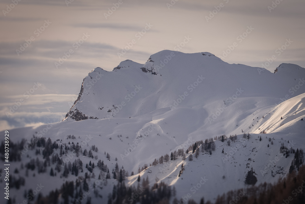 Tilt shift effect of Mount Cernera in winter conditions. Fiorentina Valley, Dolomites, Italy