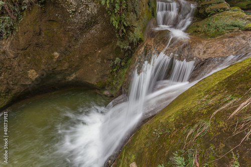 Silk effect on waterfalls in caves carved out of sandstone, Caglieron caves, Veneto, Italy