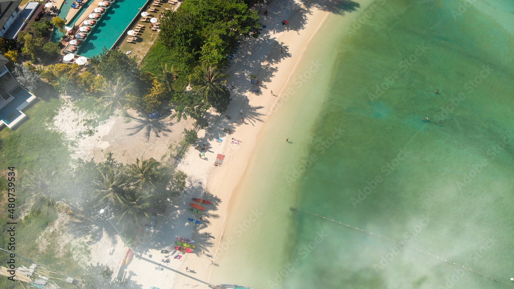 Phi Phi Don, Thailand. Overhead aerial view of Phi Phi Island coastline and beach from drone on a hot sunny day.
