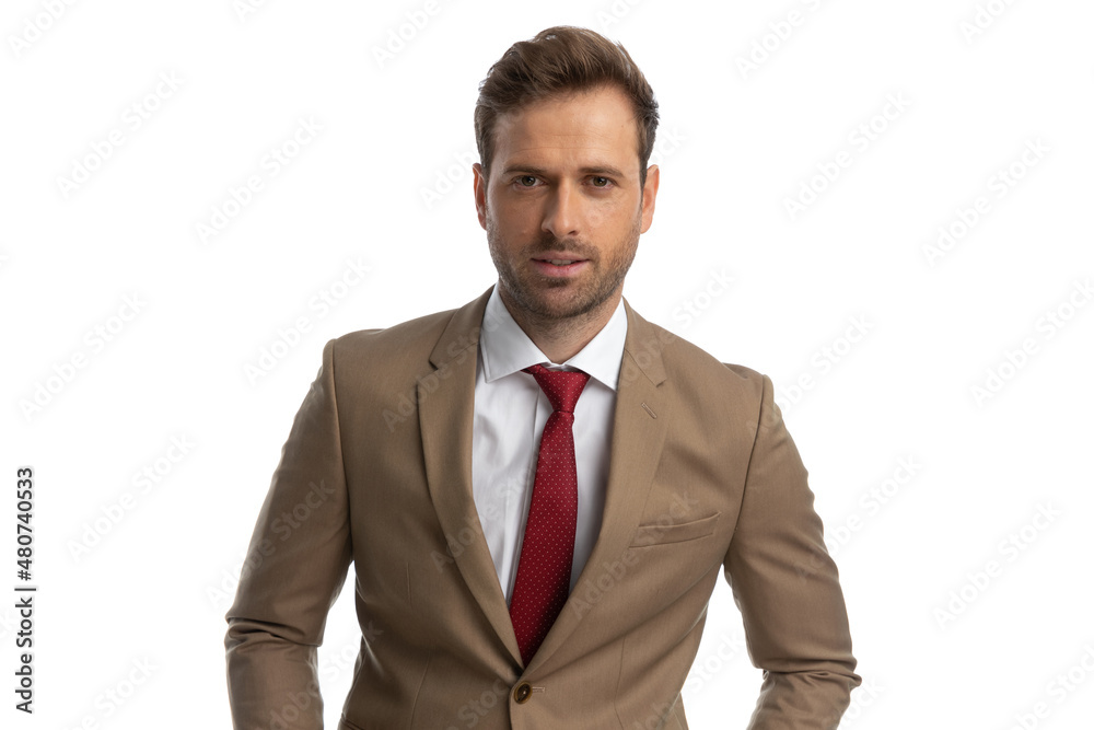 young handsome businessman posing against white background young handsome businessman posing against white background