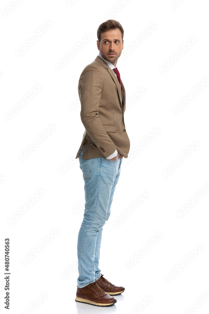 businessman standing one way and looking the other businessman standing one way and looking the other