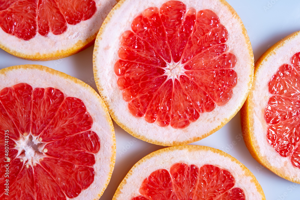 sliced pieces of grapefruit. Close-up. sliced pieces of grapefruit. Close-up.