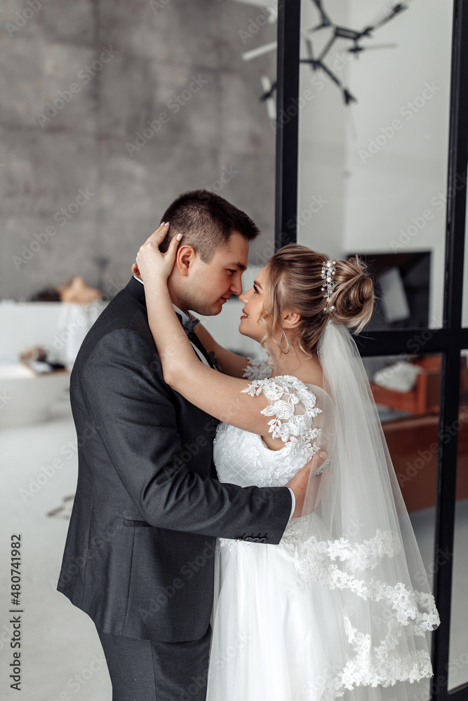 Romantic meeting of the bride and groom. The morning before the wedding. Filming in the hotel lobby.