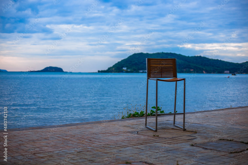 The background of a new design chair placed on the balcony of the resort for customers to sit and rest during the day. The background of a new design chair placed on the balcony of the resort for customers to sit and rest during the day.