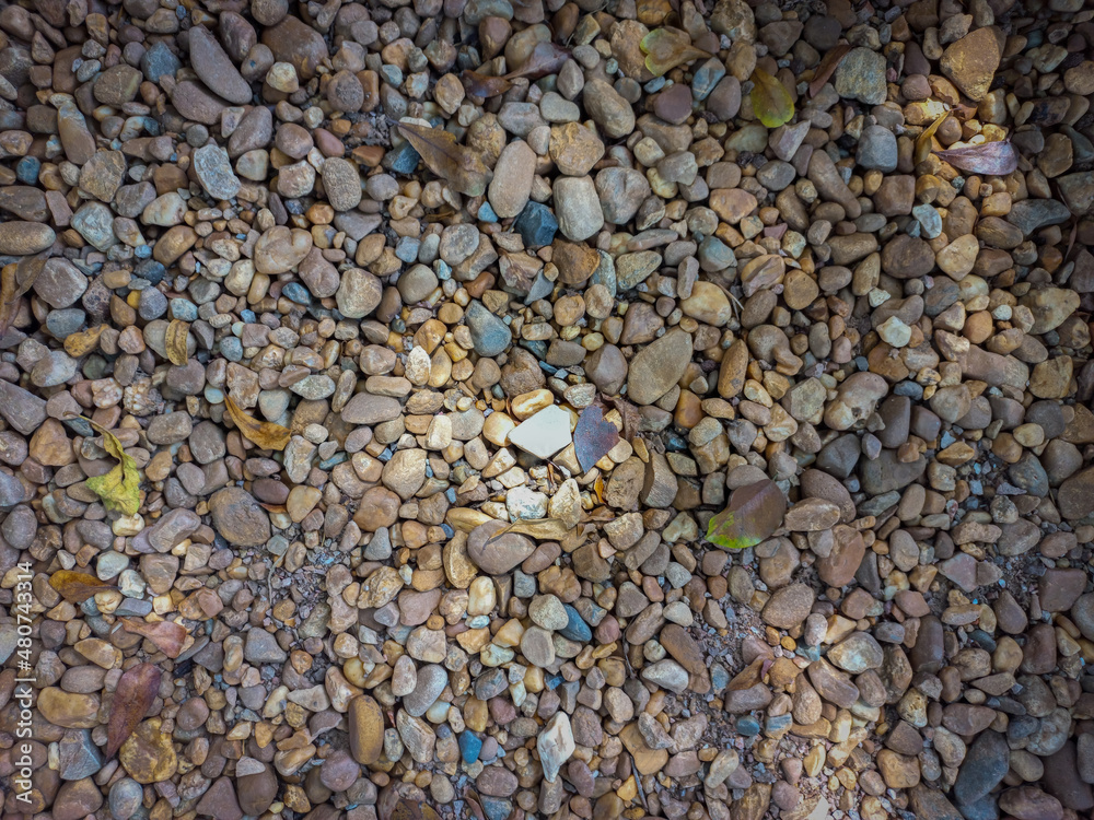 Small pebbles, brown, little sunlight. Small pebbles, brown, little sunlight.