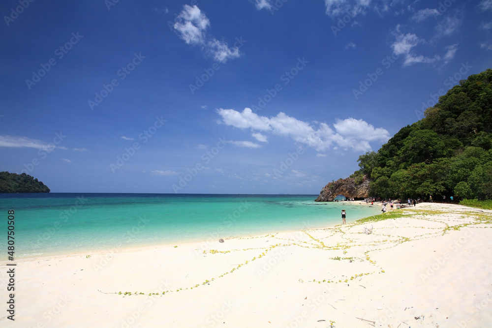 Tourist visit Koh Khai, stone arch and beach