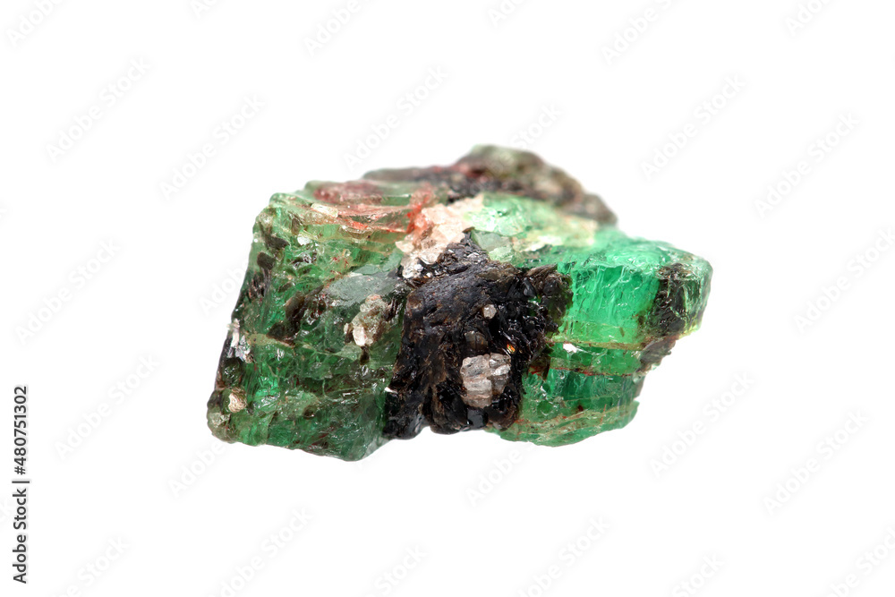 Natural rough emerald (green beryl) gemstone on white background Natural rough emerald (green beryl) gemstone on white background