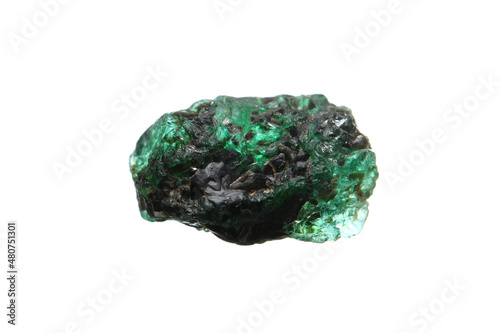 Closeup natural rough emerald (green beryl) gemstone on biotite matrix photo