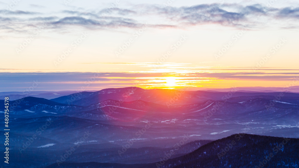 Blurred background of beautiful mountain landscape with amaizing sunset Blurred background of beautiful mountain landscape with amaizing sunset
