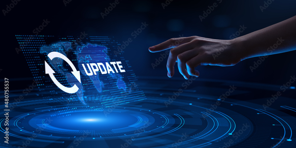 Update system software new version upgrade download. Hand pressing button on screen.