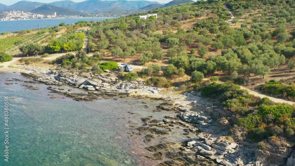 Motorhome Van on the Mediterranean Sea Greek Coast. Aerial Footage of Scenic Sea. Motorhome Van on the Mediterranean Sea Greek Coast. Aerial Footage of Scenic Sea.
