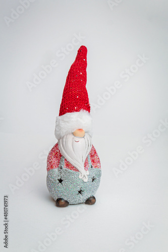 Toy Santa Claus on a white background close-up.