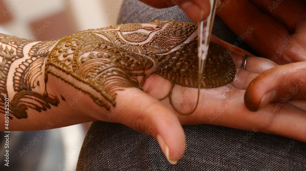 Indian wedding bride getting henna tattoo, Mehendi Stock Photo | Adobe Stock