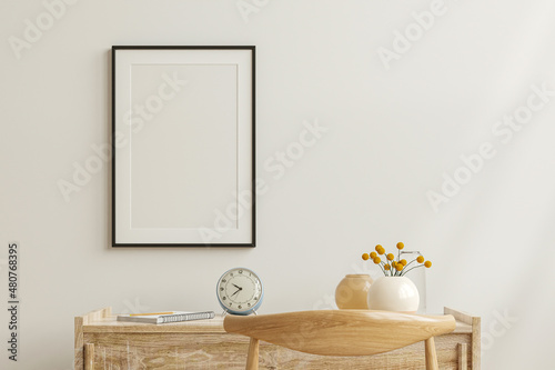 Mockup frame on work table in living room interior on empty white wall background.