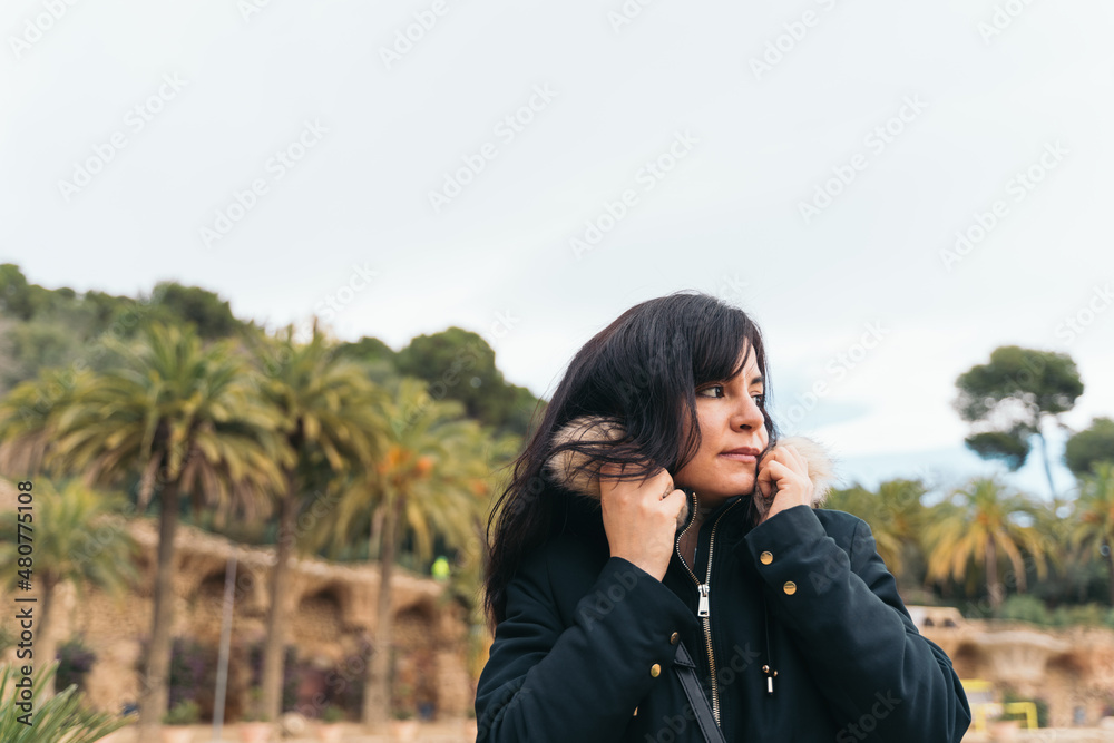 A tourist woman visiting park guell in barcelona A tourist woman visiting park guell in barcelona
