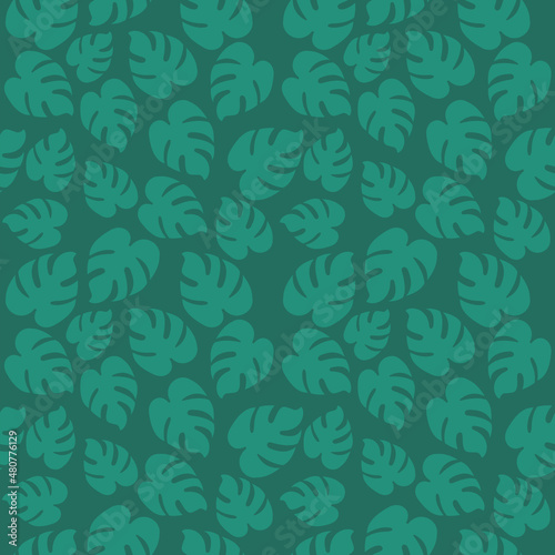 tropical pattern from monstera leaves. seamless background with floral ornament.