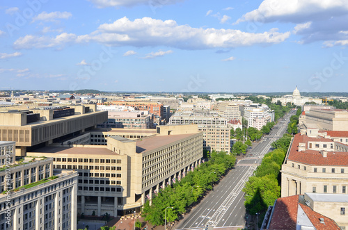 Pennsylvania Street and major monumental buildings including US Capitol in a cloudy day - Washington DC United States of America